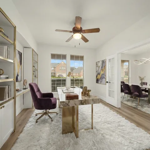 a view of empty room with windows