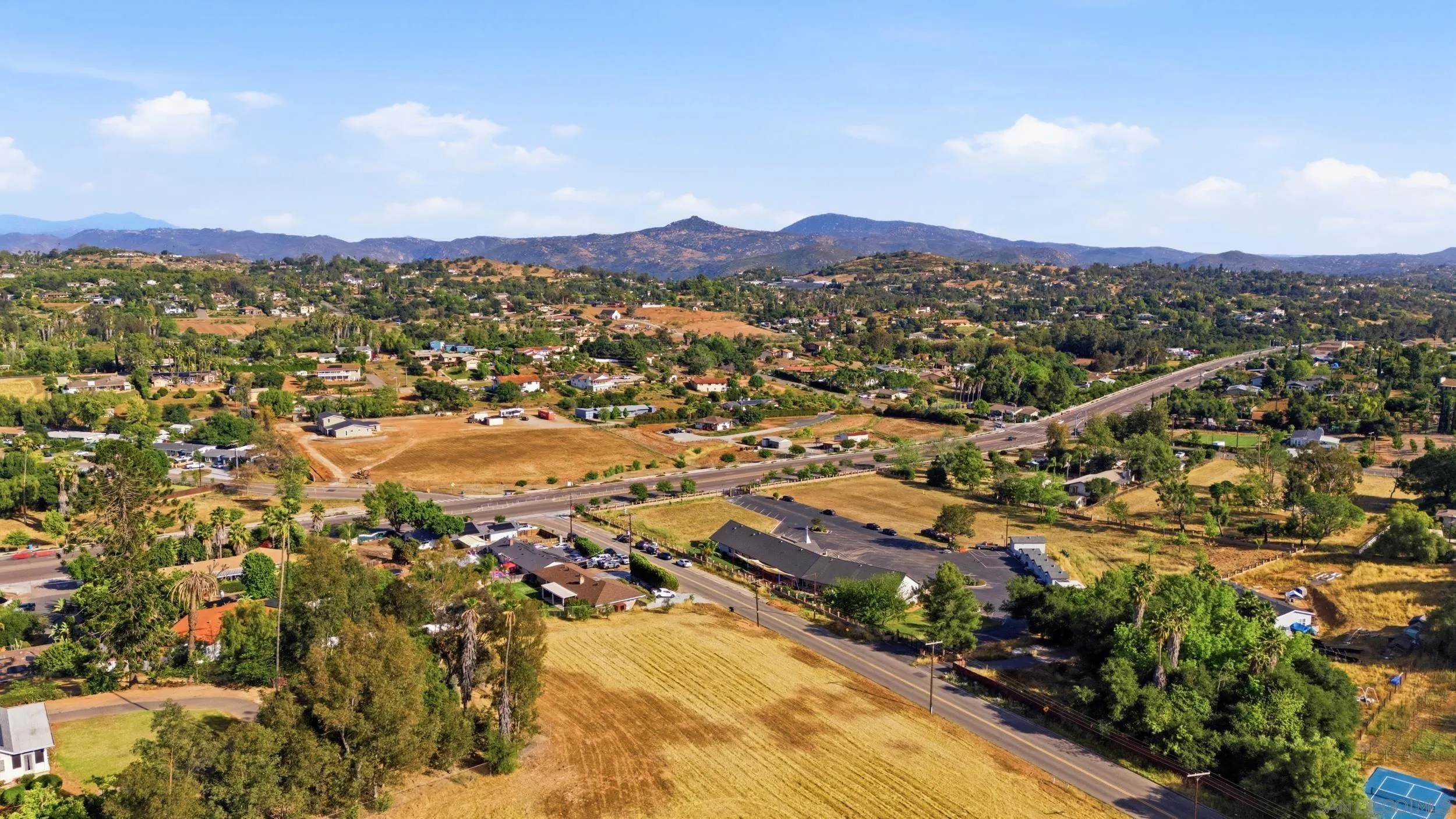 Birch Avenue, Unit E Escondido, CA 92027 - Photo 9 of 10 an aerial view of residential houses with outdoor space