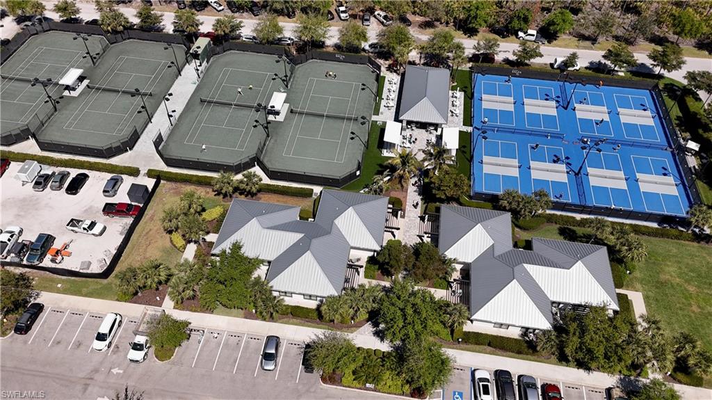 13915 Old Coast Road, Unit 504 Naples, FL 34110 - Photo 25 of 41 an aerial view of residential houses with outdoor space