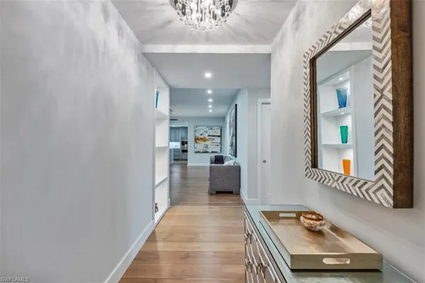 a room with furniture and a chandelier