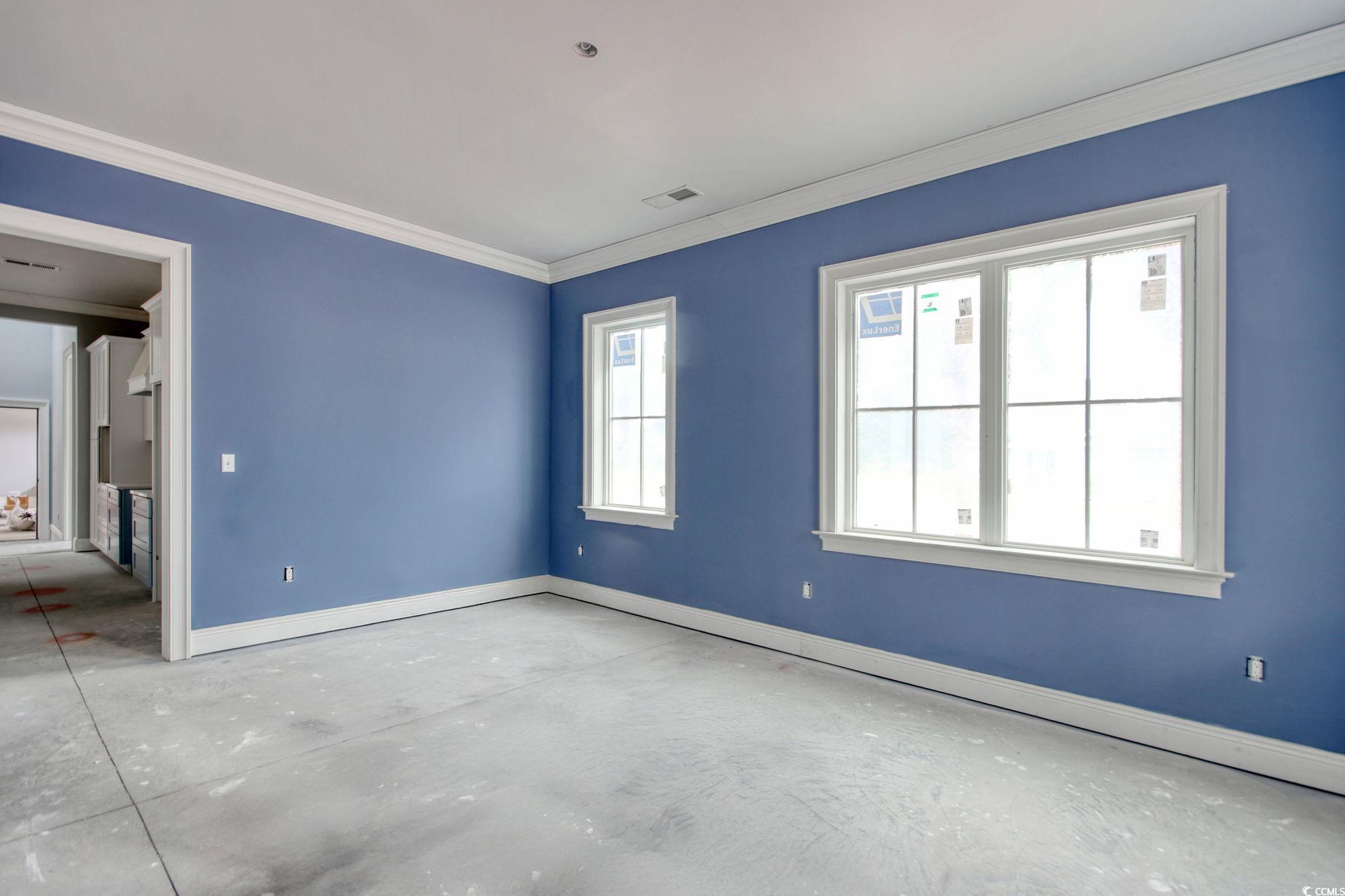 105 Michau Road Georgetown, SC 29440 - Photo 16 of 32 Empty room with baseboards, ornamental molding, an