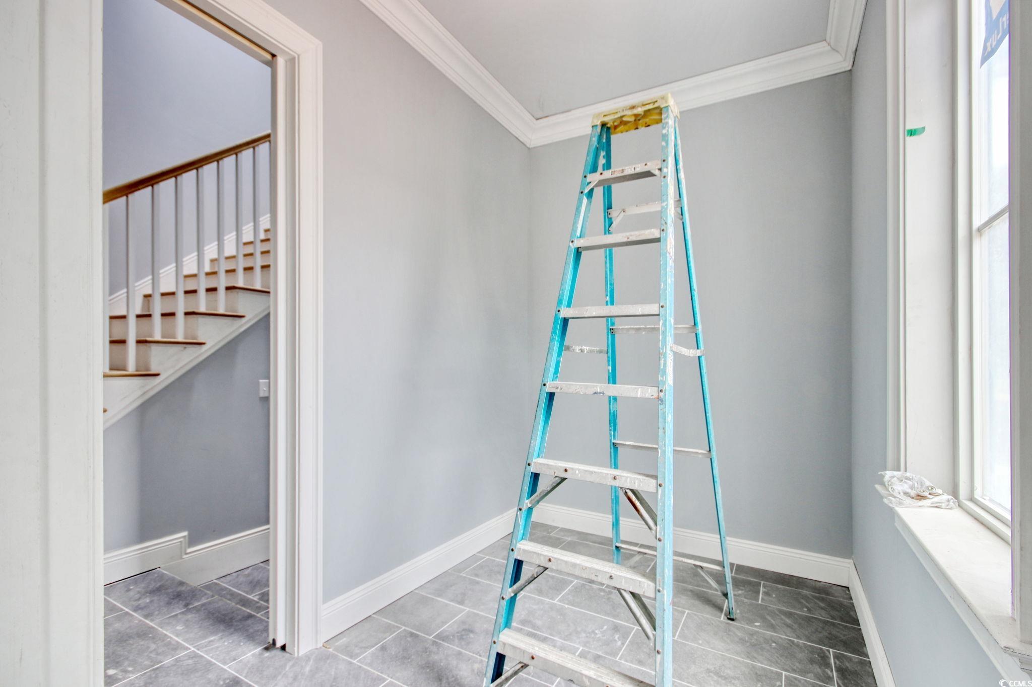 105 Michau Road Georgetown, SC 29440 - Photo 19 of 32 Interior space featuring ornamental molding, stair