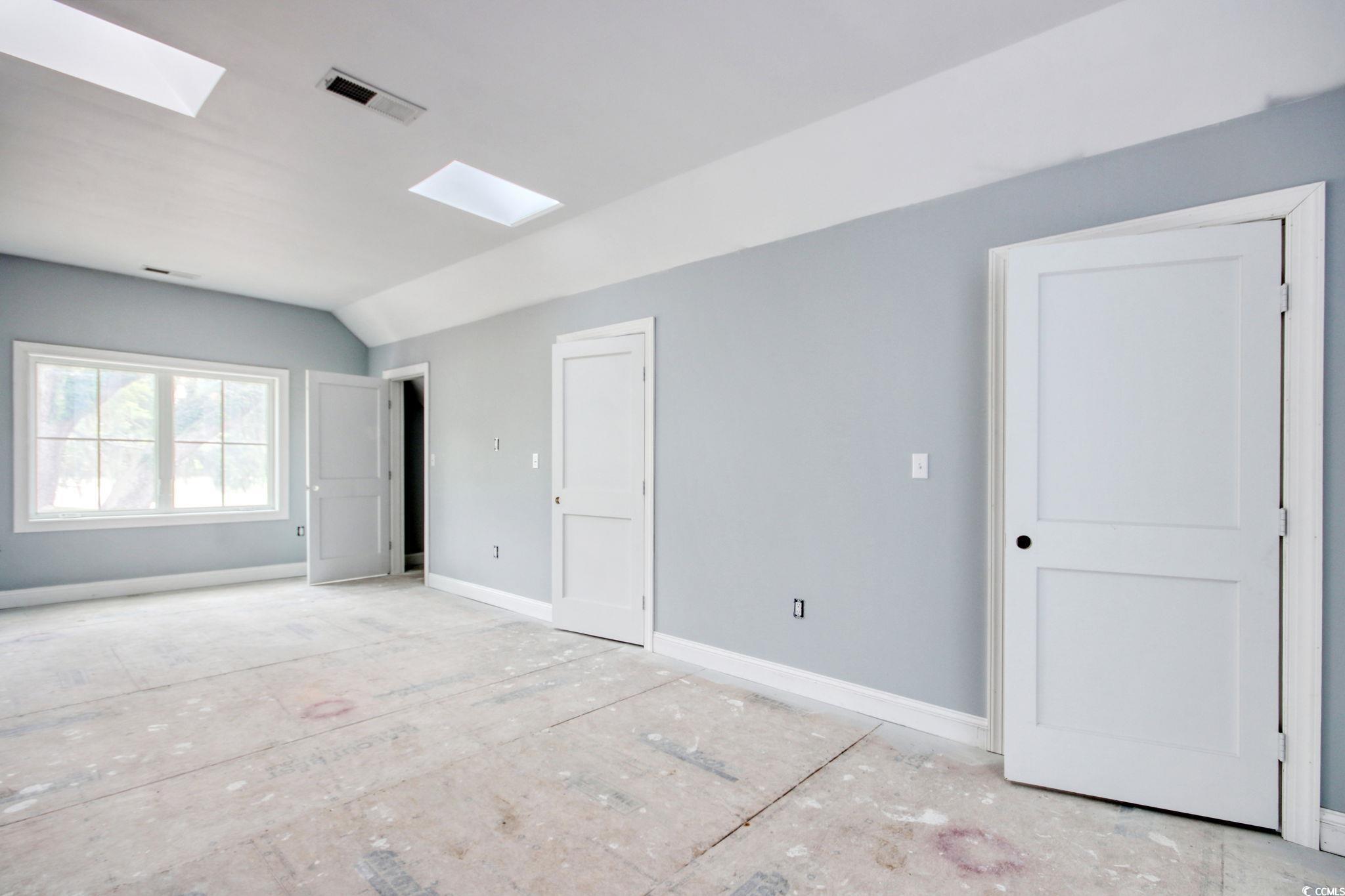 105 Michau Road Georgetown, SC 29440 - Photo 20 of 32 Unfurnished bedroom featuring a skylight, vaulted