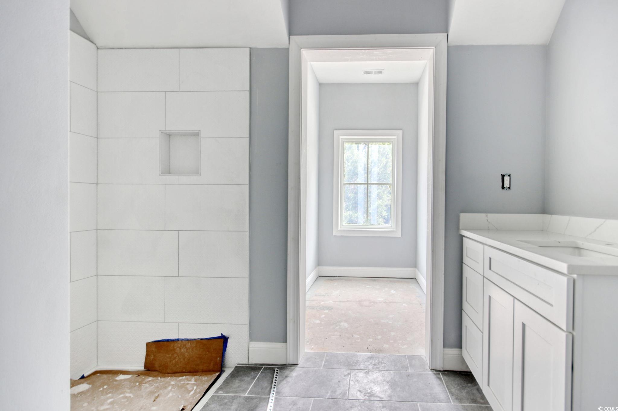 105 Michau Road Georgetown, SC 29440 - Photo 23 of 32 Bathroom featuring vanity, tile patterned flooring