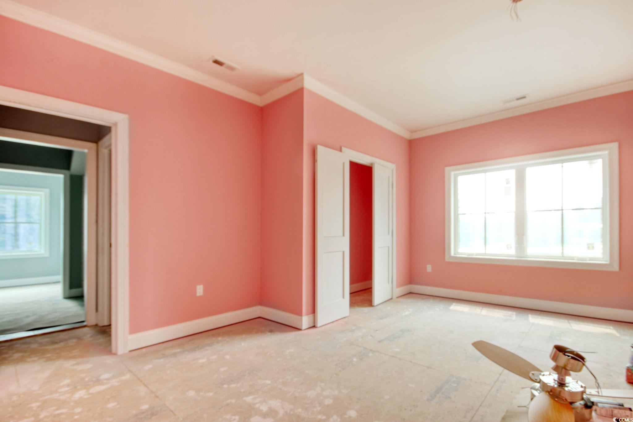 105 Michau Road Georgetown, SC 29440 - Photo 25 of 32 Unfurnished bedroom with crown molding and baseboa