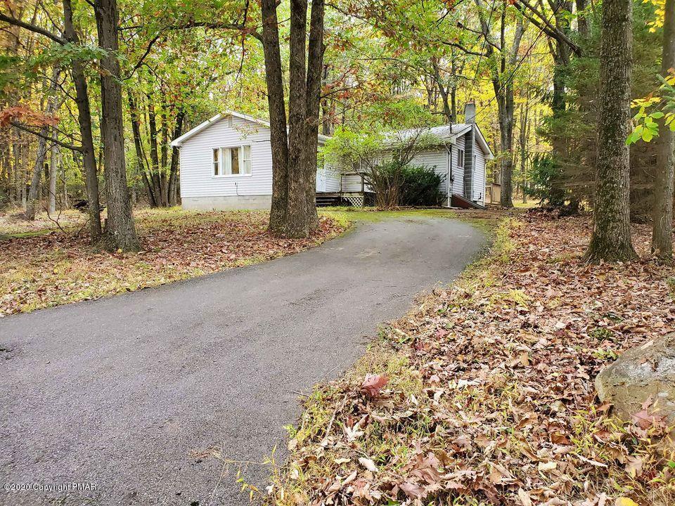 1615 Silver Maple Road Effort, PA 18330 - Photo 1 of 13 a view of a house with a tree in the background