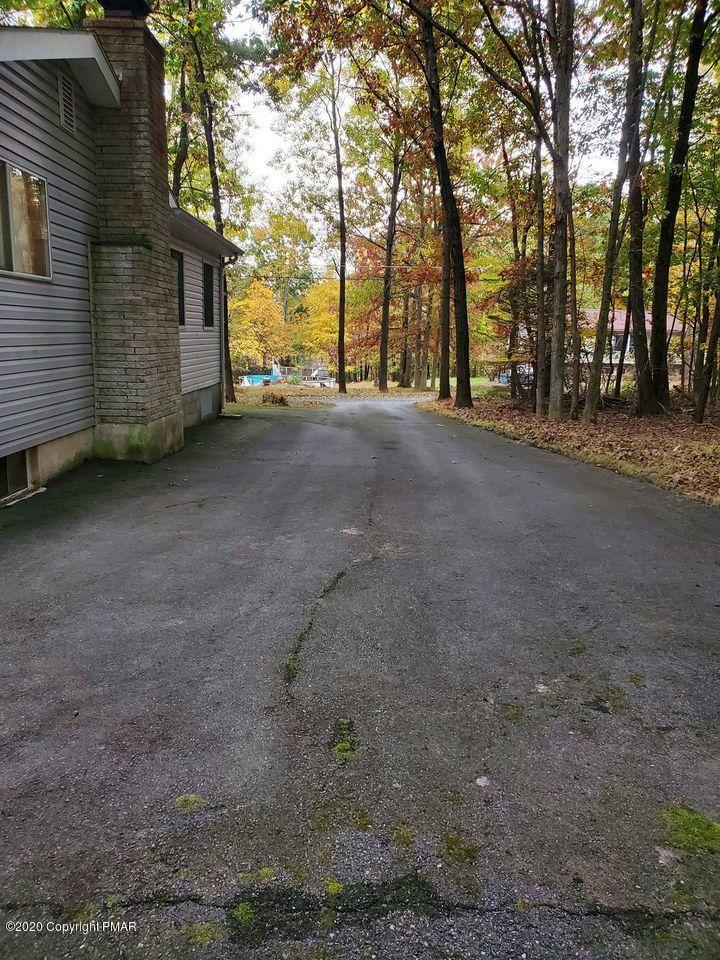 1615 Silver Maple Road Effort, PA 18330 - Photo 4 of 13 a view of a house with large trees