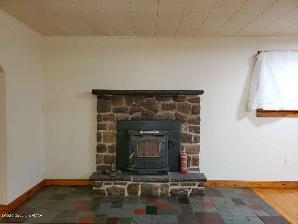 1615 Silver Maple Road Effort, PA 18330 - Photo 6 of 13 a room with fireplace
