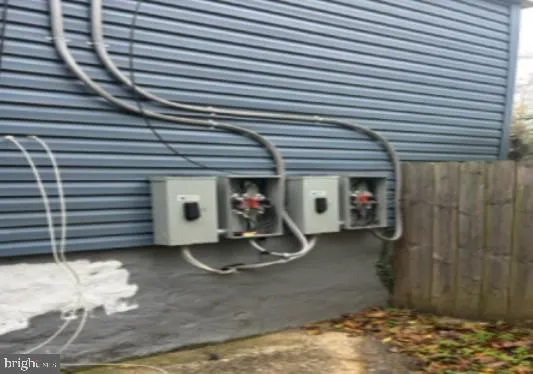 a view of a room with wooden walls