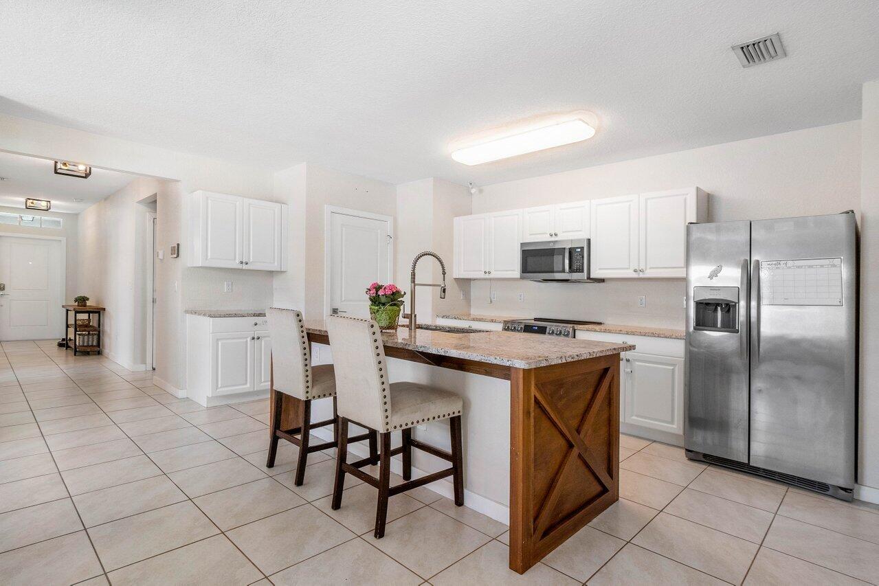 6846 Mitchell Street Jupiter, FL 33458 - Photo 6 of 26 006-6846MitchellStreet-Jupiter-FL-33458-