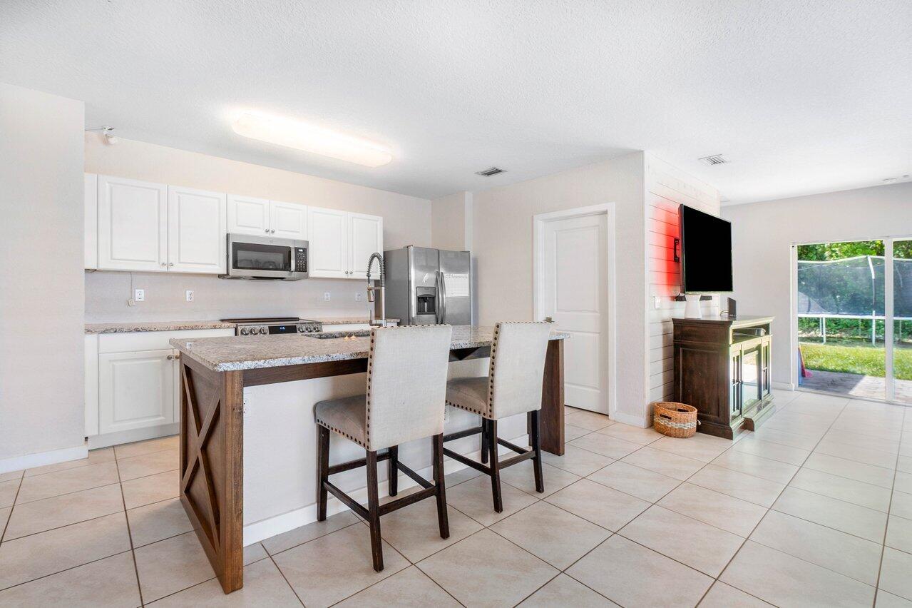 6846 Mitchell Street Jupiter, FL 33458 - Photo 7 of 26 007-6846MitchellStreet-Jupiter-FL-33458-