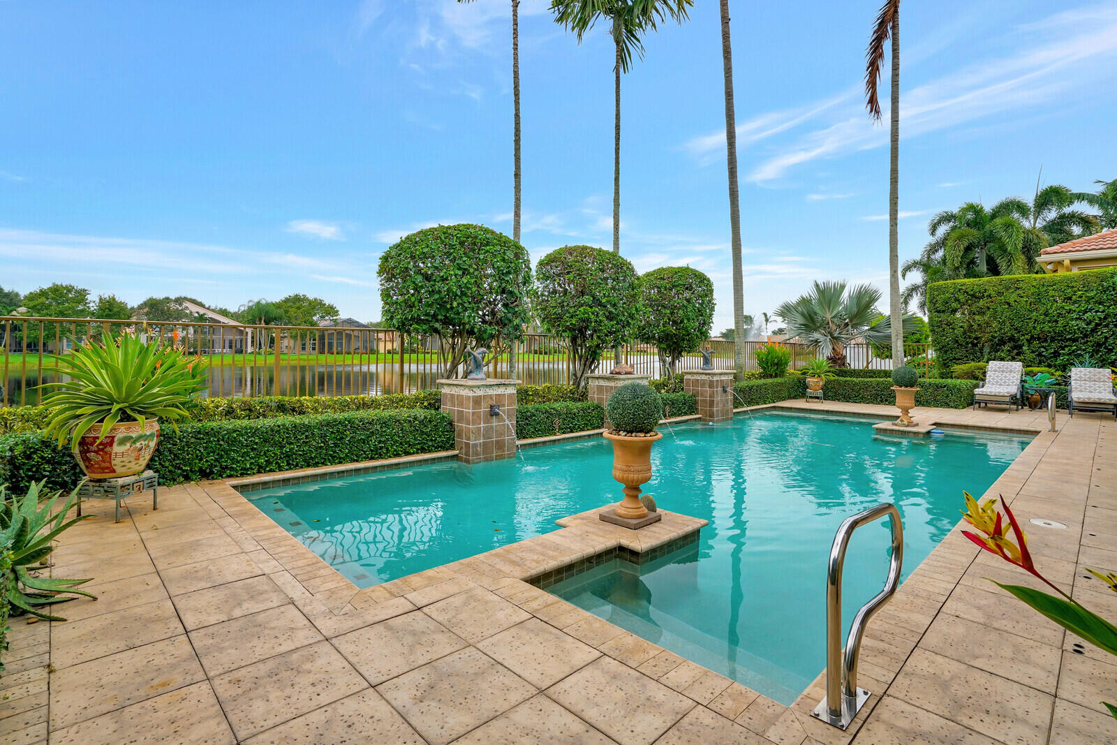 7016 Corning Circle Boynton Beach, FL 33437 - Photo 41 of 66 pool with steps to enter