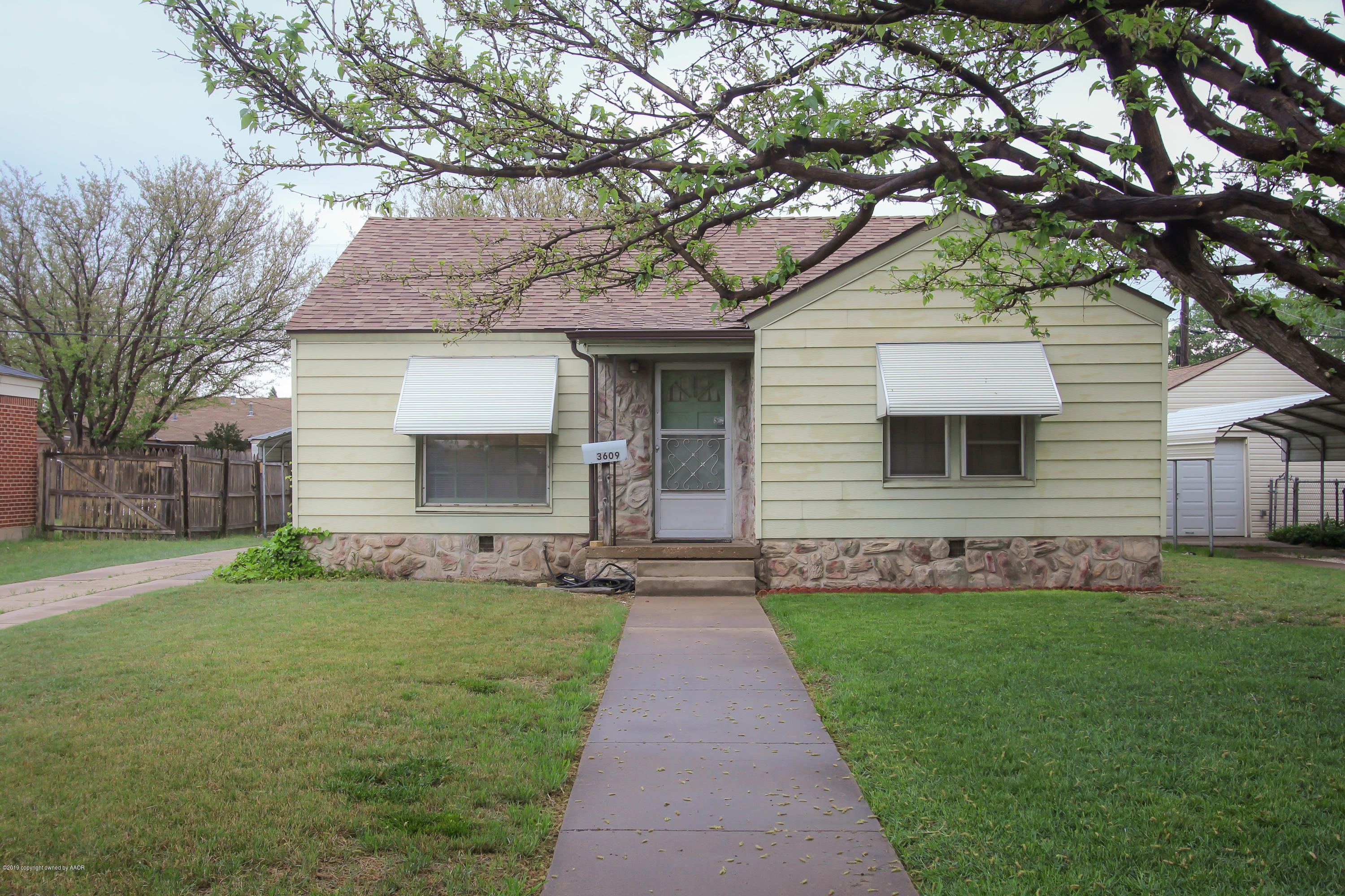 a front view of house with yard