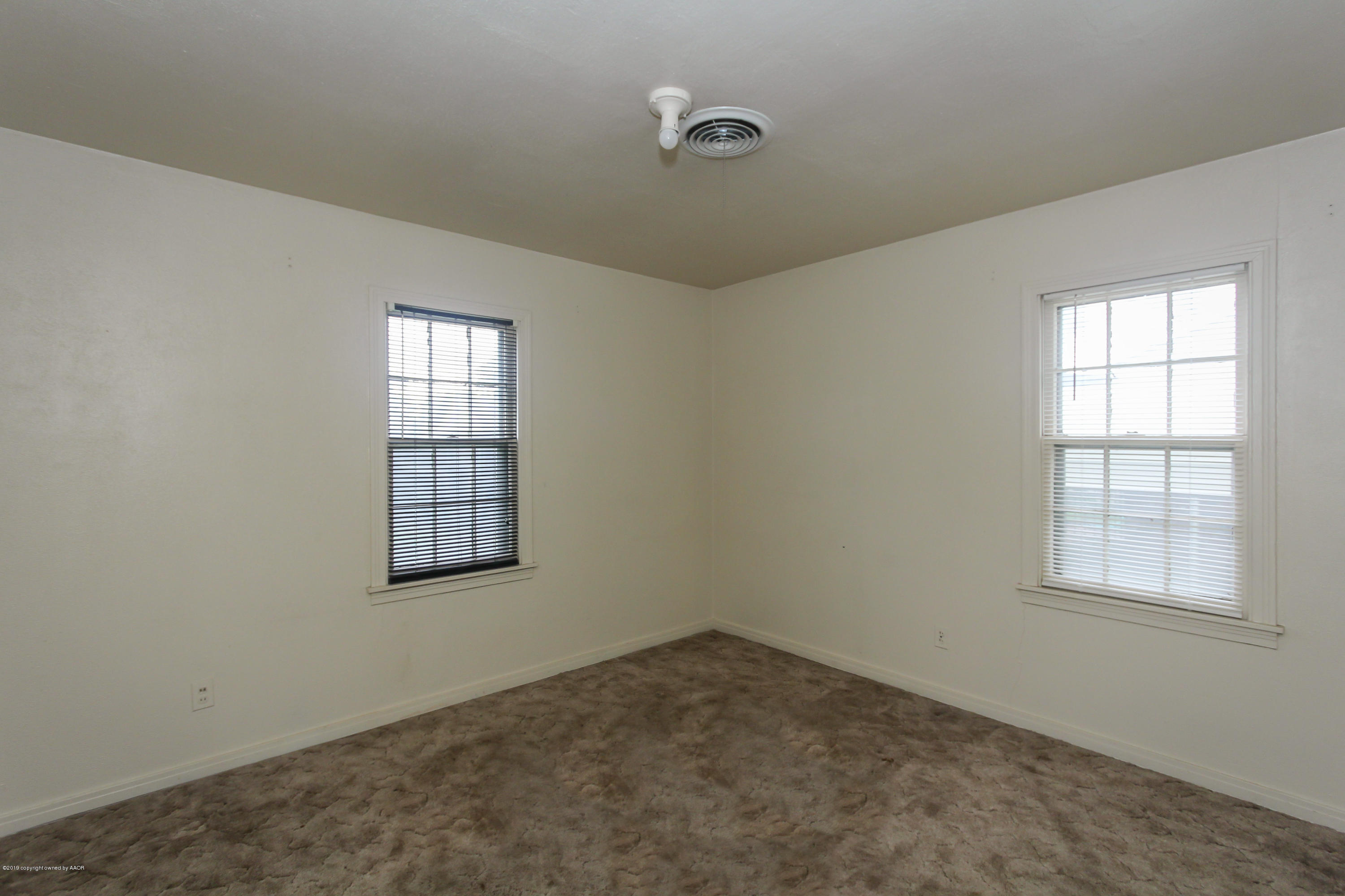 3609 South Lipscomb Street Amarillo, TX 79110 - Photo 14 of 28 an empty room with windows