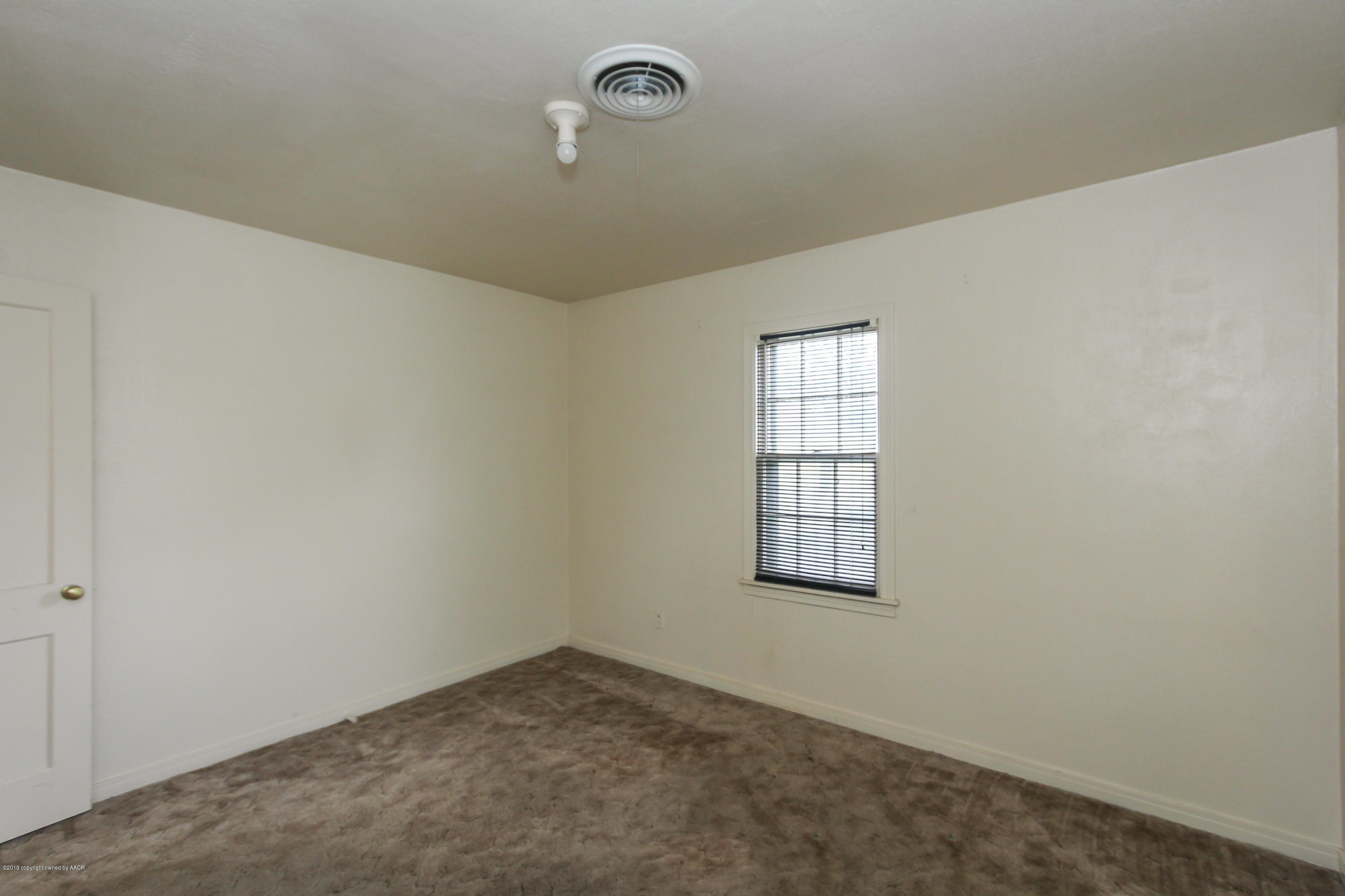 3609 South Lipscomb Street Amarillo, TX 79110 - Photo 15 of 28 an empty room with windows
