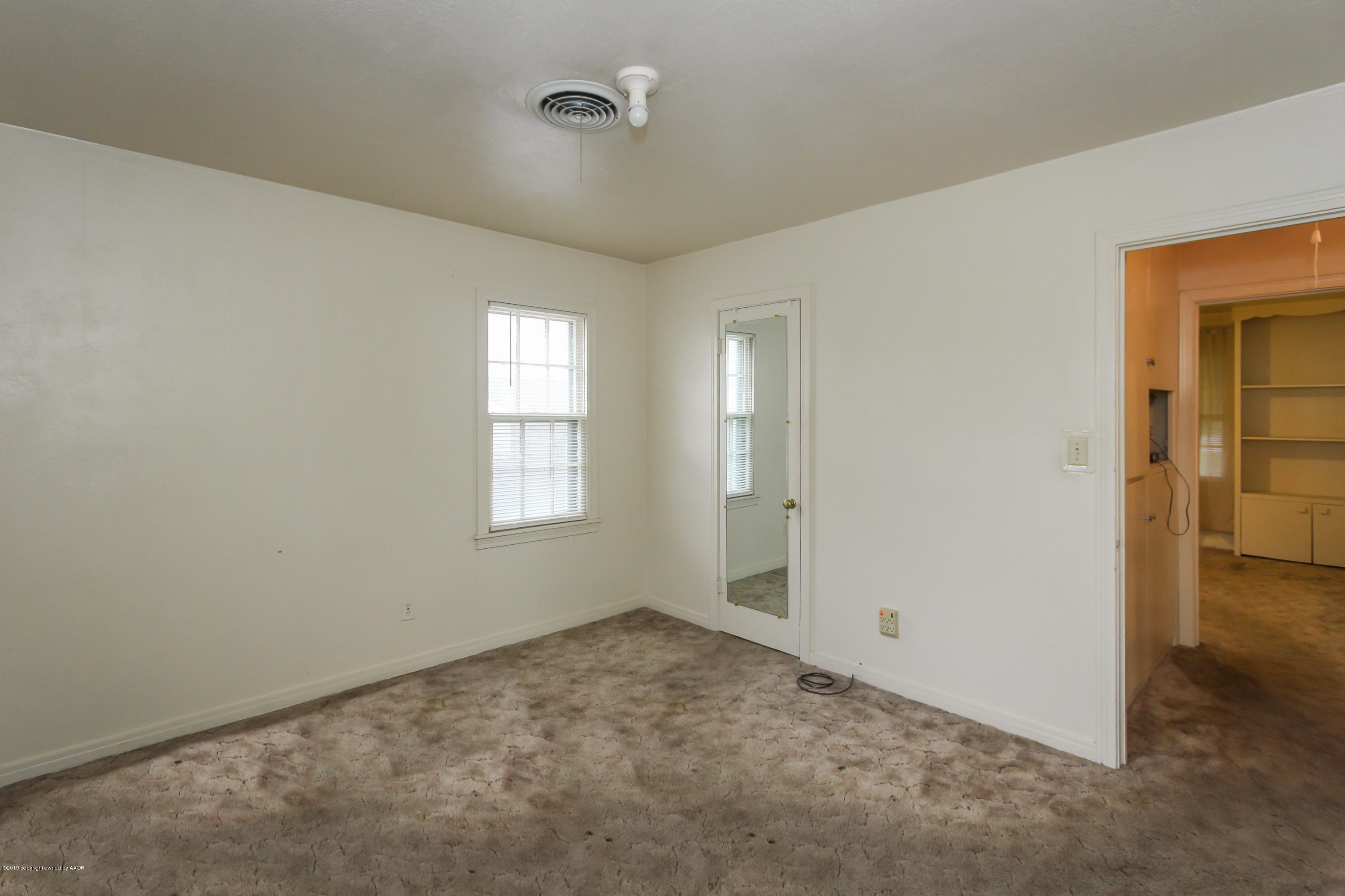 3609 South Lipscomb Street Amarillo, TX 79110 - Photo 16 of 28 an empty room with windows