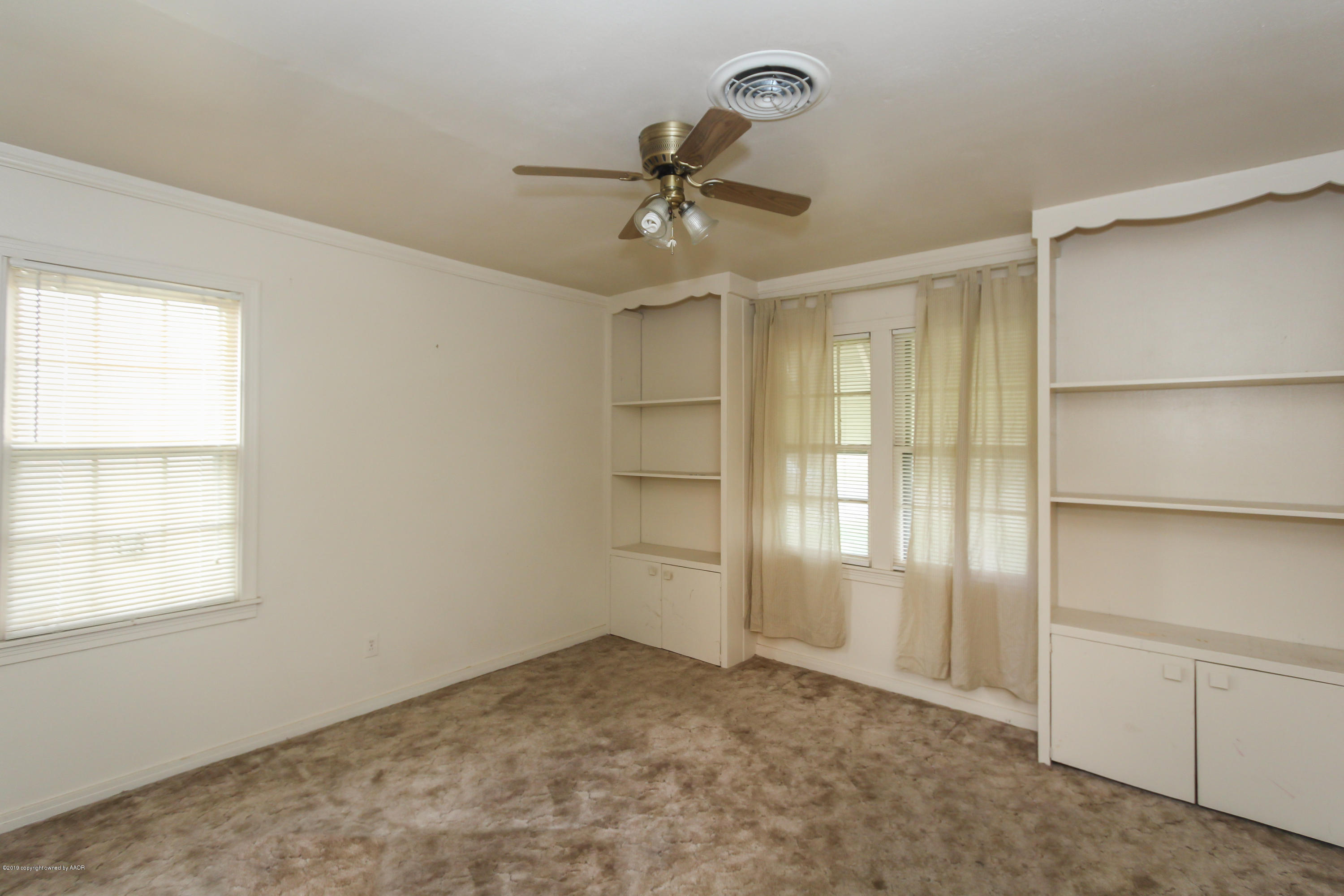 3609 South Lipscomb Street Amarillo, TX 79110 - Photo 17 of 28 a view of an empty room with a window