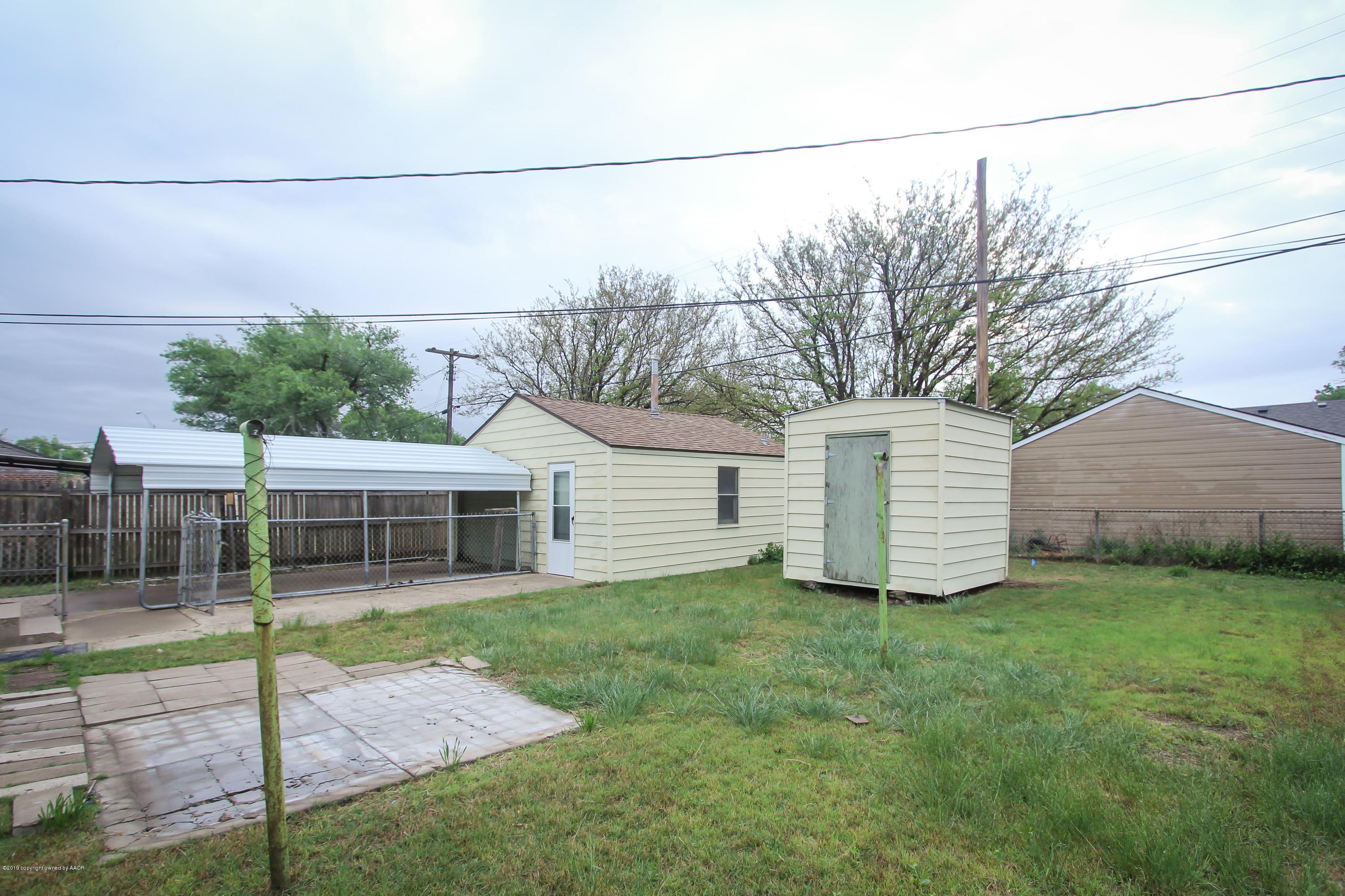 3609 South Lipscomb Street Amarillo, TX 79110 - Photo 23 of 28 a view of a house with a yard and sitting area