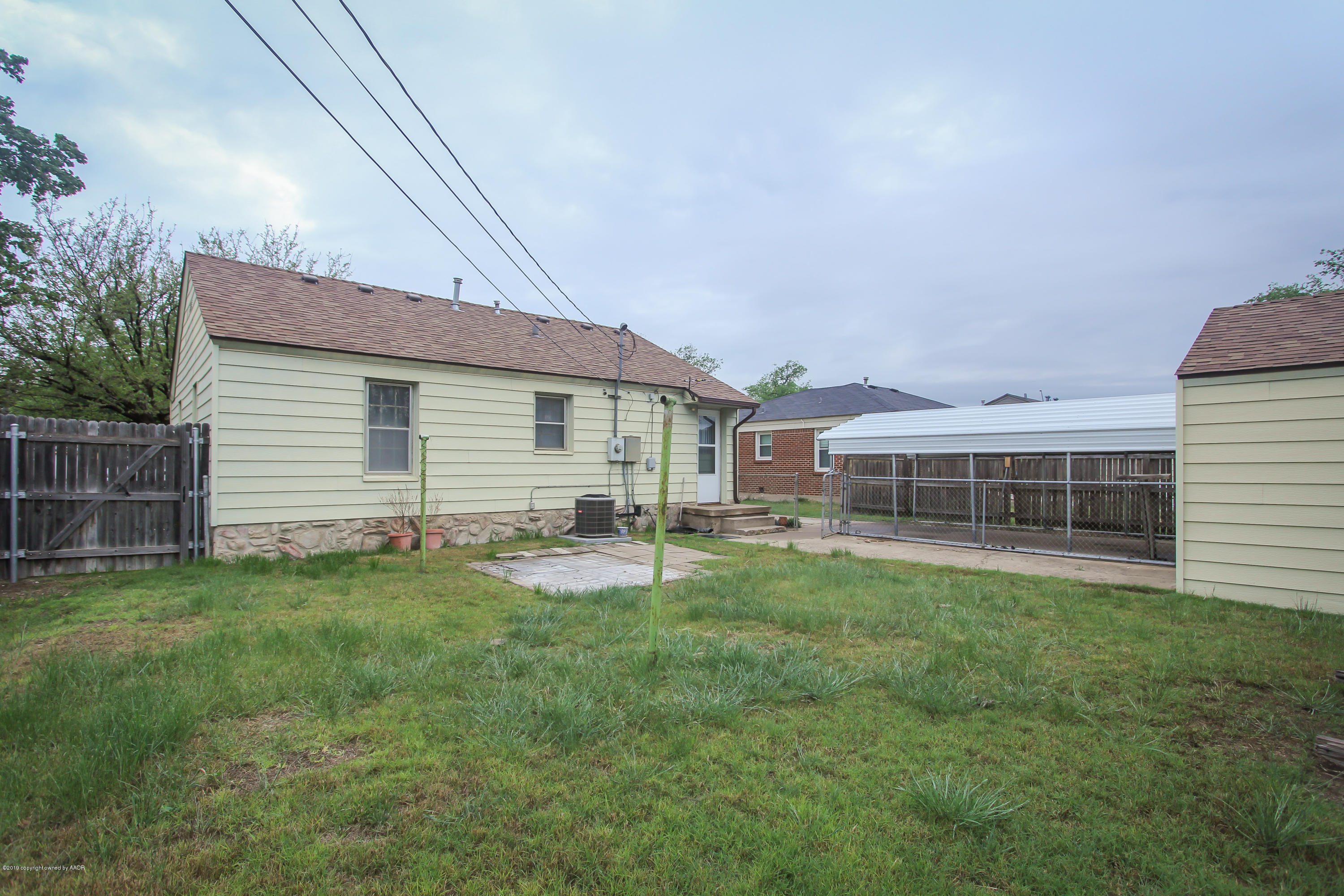 3609 South Lipscomb Street Amarillo, TX 79110 - Photo 25 of 28 a view of a house with a yard and sitting area