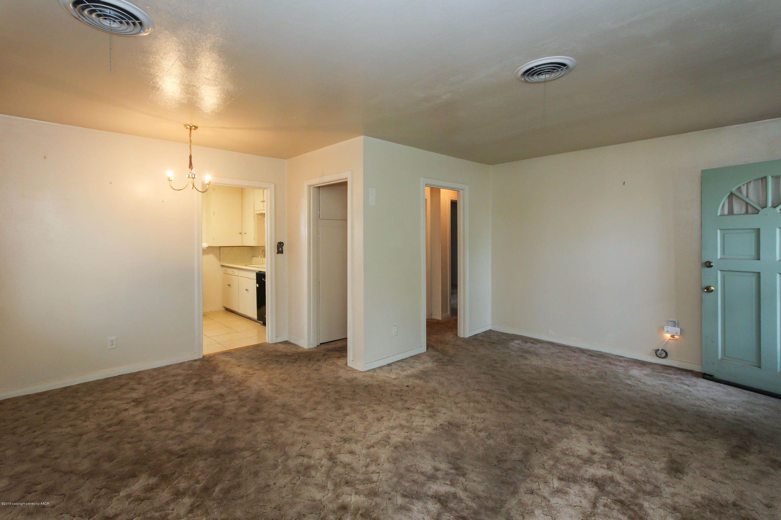 3609 South Lipscomb Street Amarillo, TX 79110 - Photo 7 of 28 a view of a kitchen with refrigerator and a sink