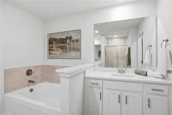 a bathroom with a sink and a bathtub