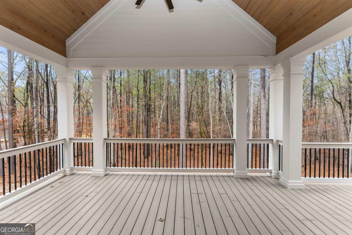103 Mags Path Eatonton, GA 31024 - Photo 24 of 66 a view of a porch with wooden floor and outdoor space