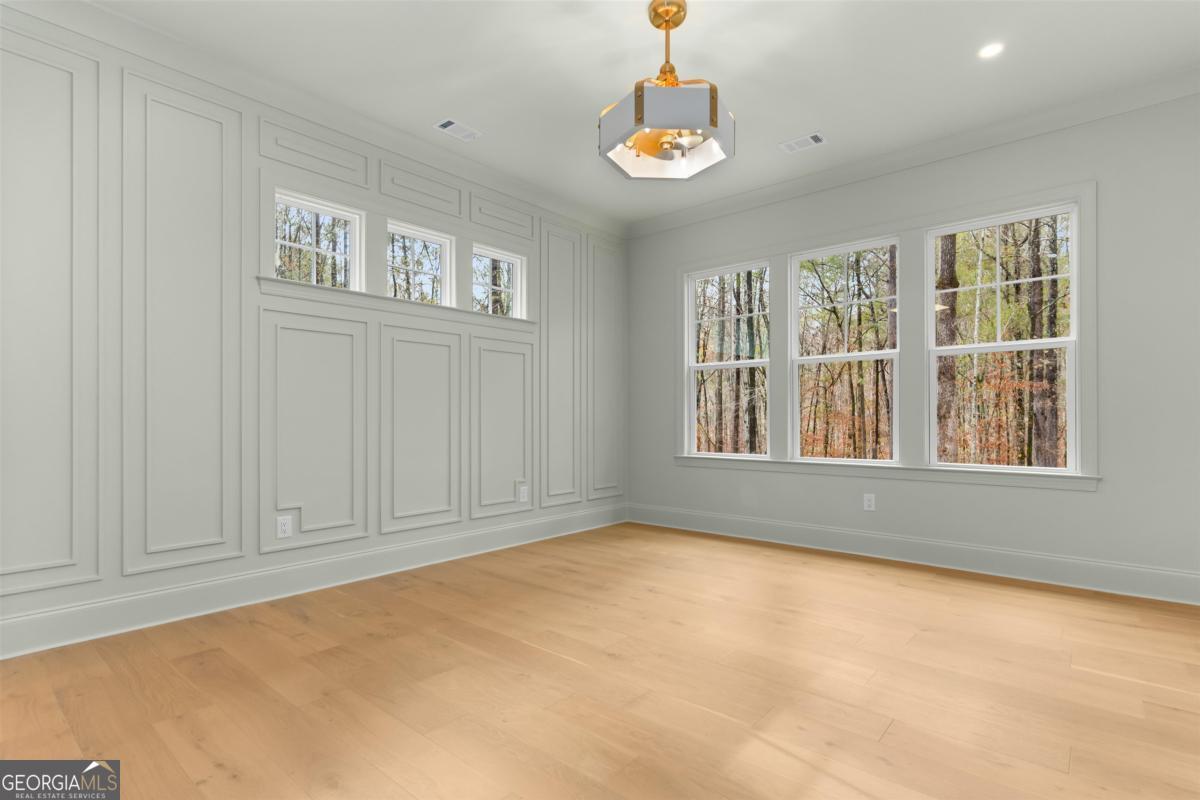 103 Mags Path Eatonton, GA 31024 - Photo 27 of 66 a view of an empty room with a window