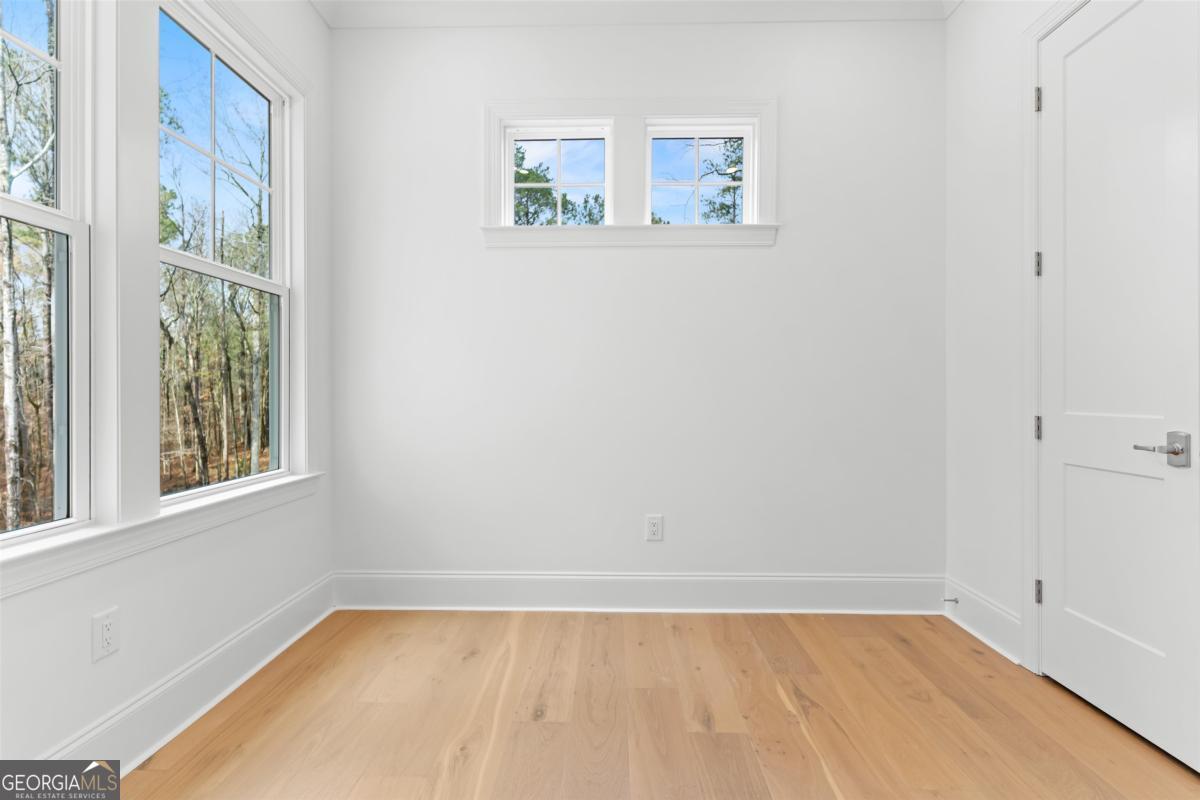 103 Mags Path Eatonton, GA 31024 - Photo 36 of 66 an empty room with a window