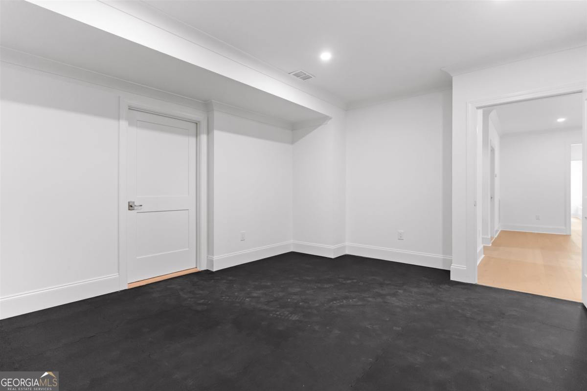 103 Mags Path Eatonton, GA 31024 - Photo 40 of 66 an empty room with an entryway