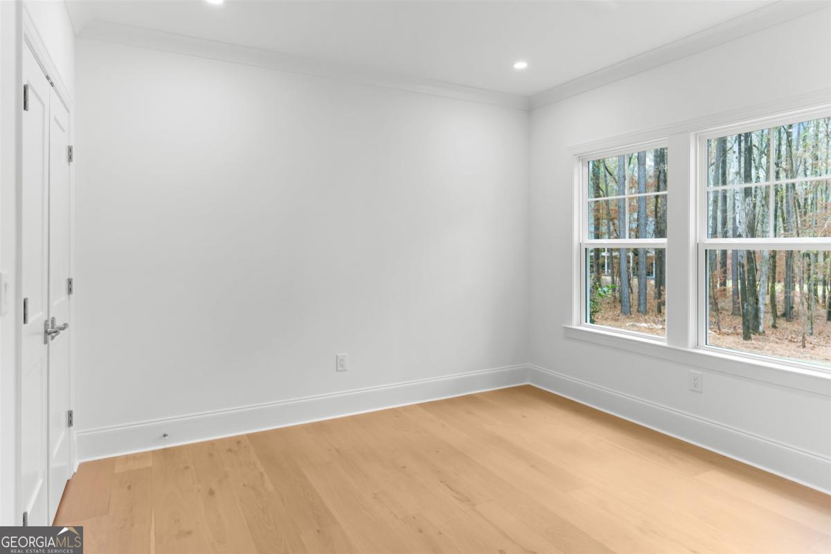 103 Mags Path Eatonton, GA 31024 - Photo 42 of 66 a view of an empty room with a window