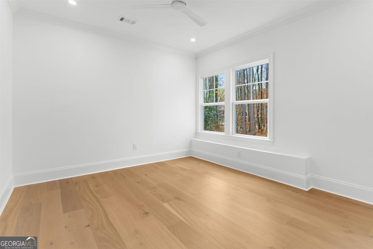 103 Mags Path Eatonton, GA 31024 - Photo 44 of 66 an empty room with windows