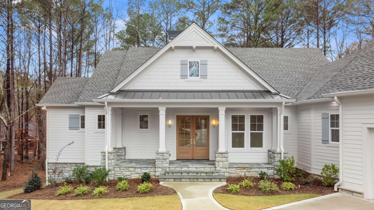 103 Mags Path Eatonton, GA 31024 - Photo 53 of 66 a front view of a house with garden