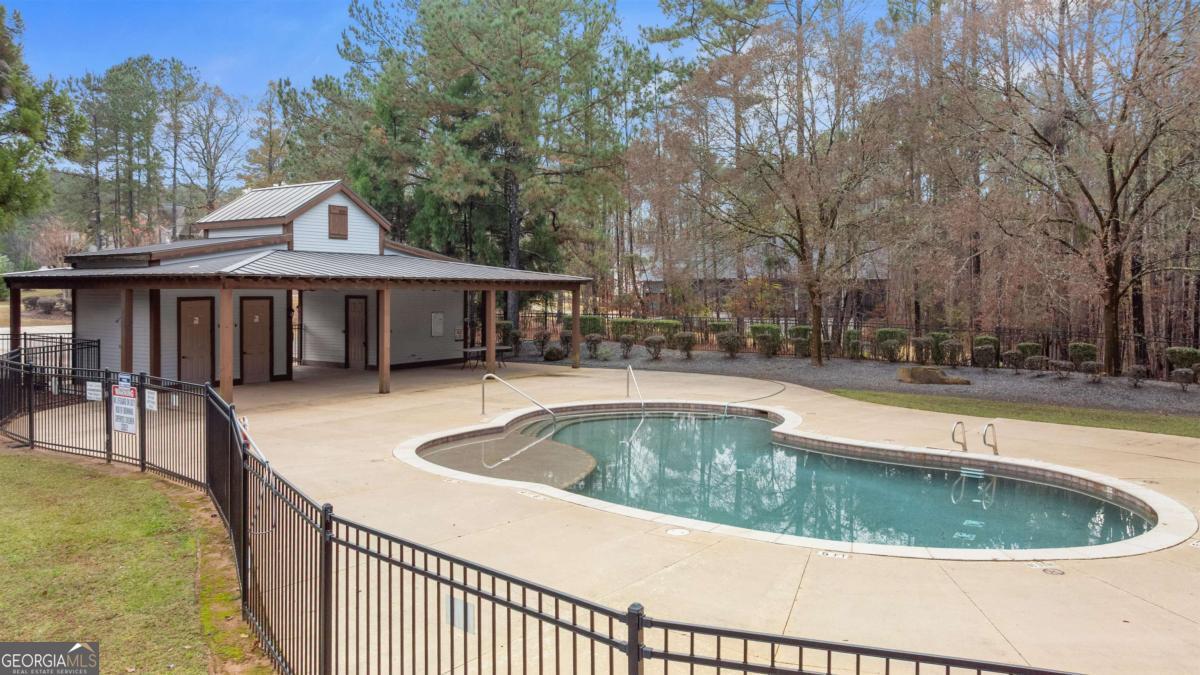 103 Mags Path Eatonton, GA 31024 - Photo 58 of 66 a view of a house with swimming pool and sitting area