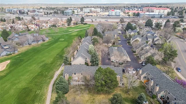 an aerial view of a houses with outdoor space