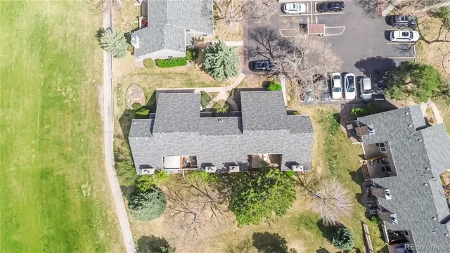 aerial view of a house with a garden