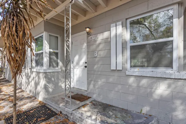 a view of a glass door with glass windows