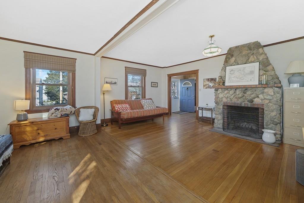 60 Virginia Road Waltham, MA 02453 - Photo 5 of 19 a living room with furniture and a fireplace