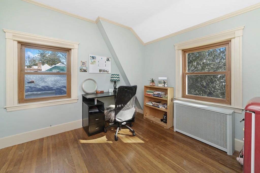 60 Virginia Road Waltham, MA 02453 - Photo 10 of 19 a view of a workspace with furniture and a window