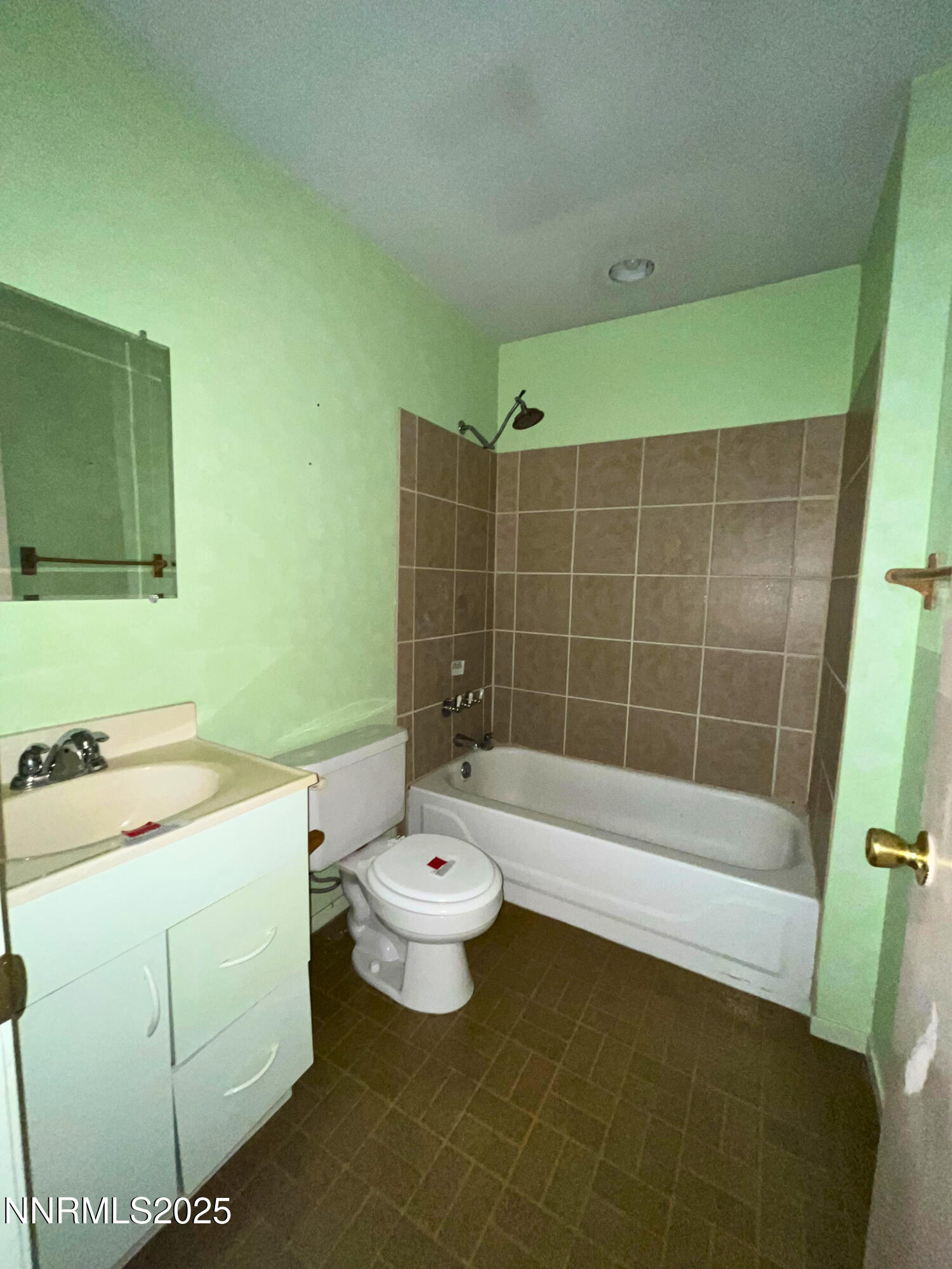 645 K Street Hawthorne, NV 89415 - Photo 11 of 16 a bathroom with a sink toilet and shower