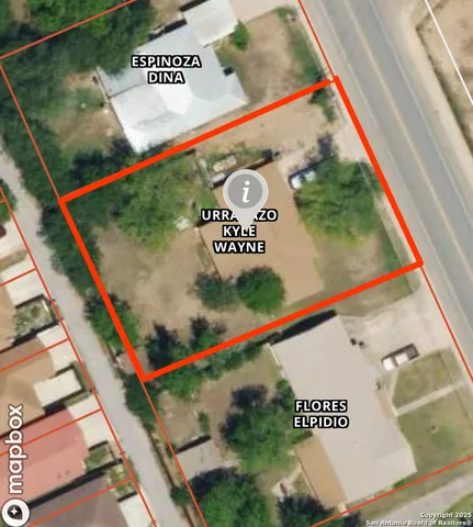 a view of a yard in front of a house with large trees