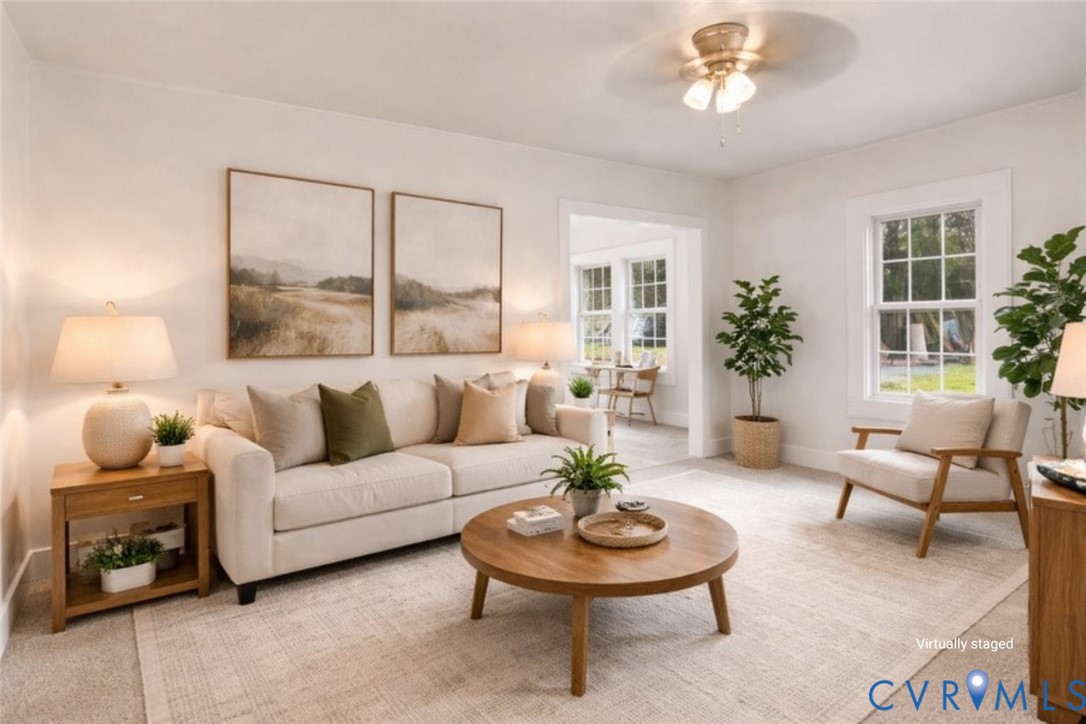 239 Brunswick Road Emporia, VA 23847 - Photo 4 of 22 Bright living area featuring a ceiling fan. Virtua