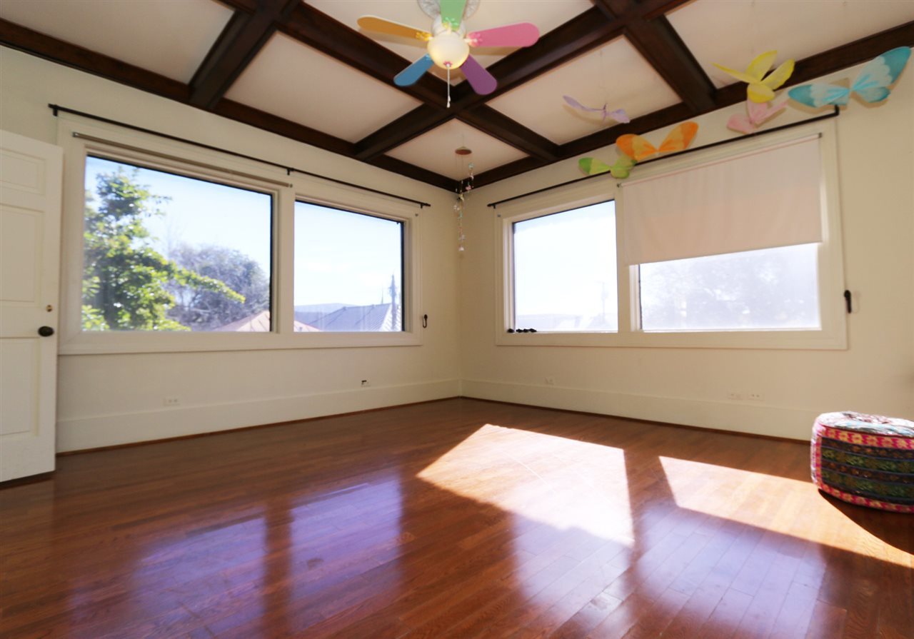 1619 Matamoros Street Laredo, TX 78040 - Photo 14 of 20 a view of an empty room with wooden floor and a window