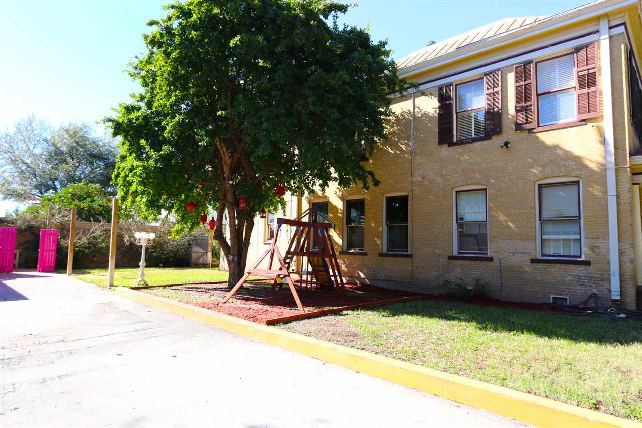 1619 Matamoros Street Laredo, TX 78040 - Photo 17 of 20 a view of a house with a backyard