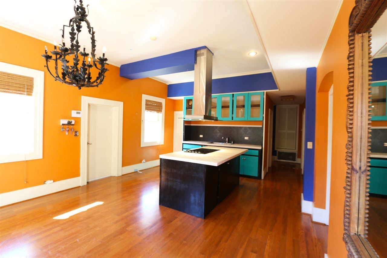 1619 Matamoros Street Laredo, TX 78040 - Photo 6 of 20 a kitchen with stainless steel appliances granite countertop a sink and a refrigerator