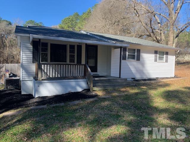 1314 Dowling Road Raleigh, NC 27610 - Photo 1 of 34 a view of a house with a yard