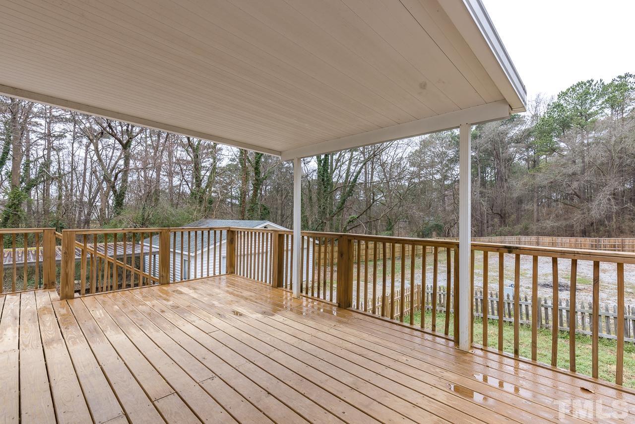 1314 Dowling Road Raleigh, NC 27610 - Photo 21 of 34 a view of balcony with wooden floor
