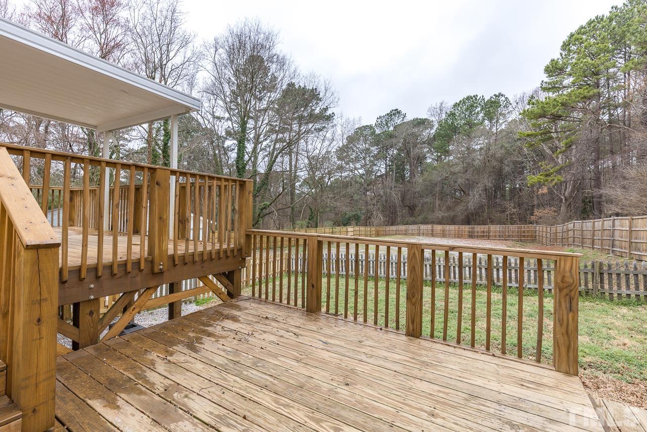 1314 Dowling Road Raleigh, NC 27610 - Photo 22 of 34 a view of a wooden roof deck