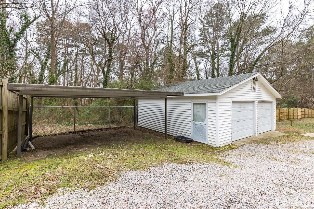 1314 Dowling Road Raleigh, NC 27610 - Photo 25 of 34 a view of a house with a yard
