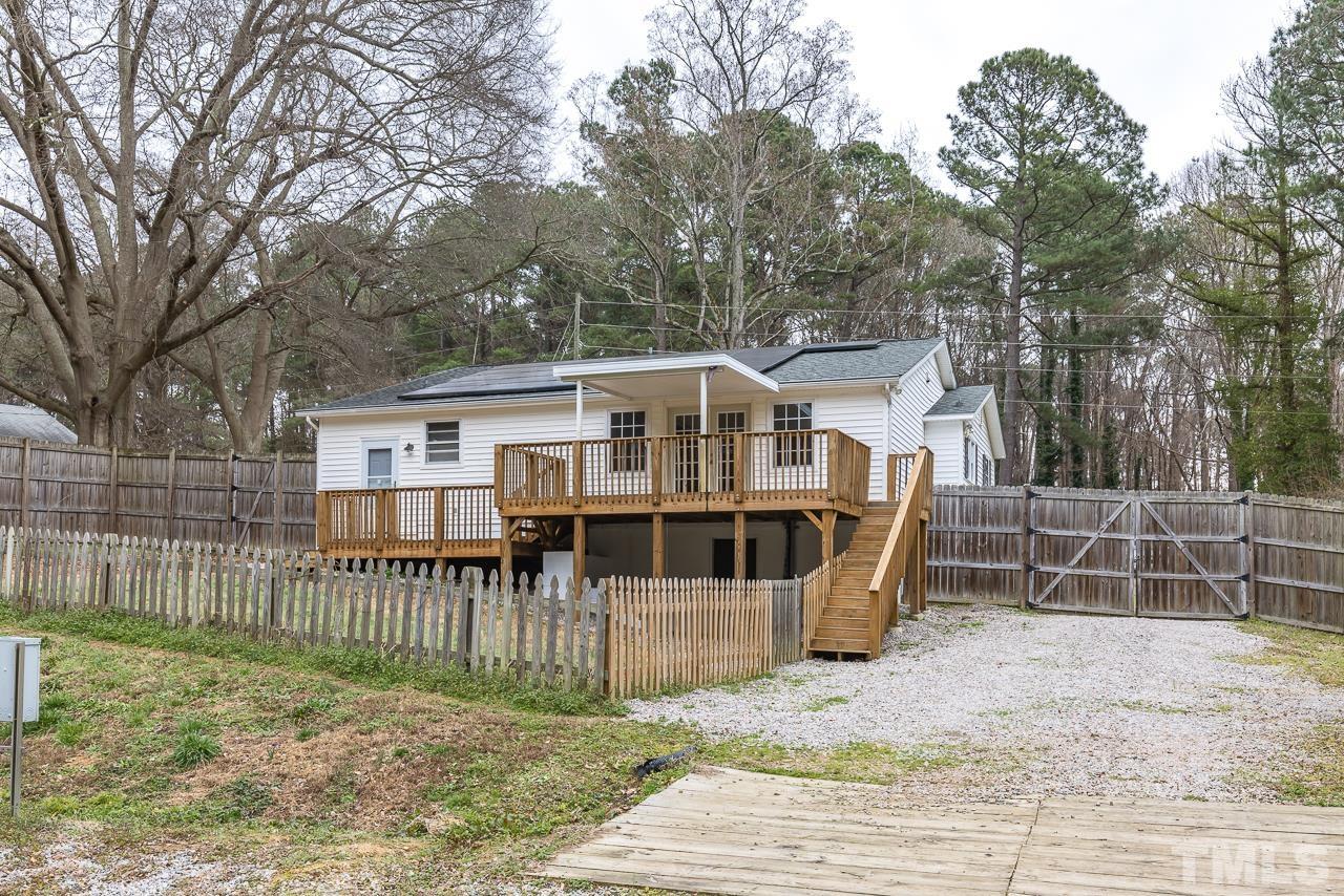 1314 Dowling Road Raleigh, NC 27610 - Photo 26 of 34 a view of a house with a backyard