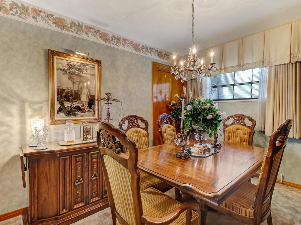 542233 Lem Turner Road Callahan, FL 32011 - Photo 2 of 31 a dining room with furniture and chandelier